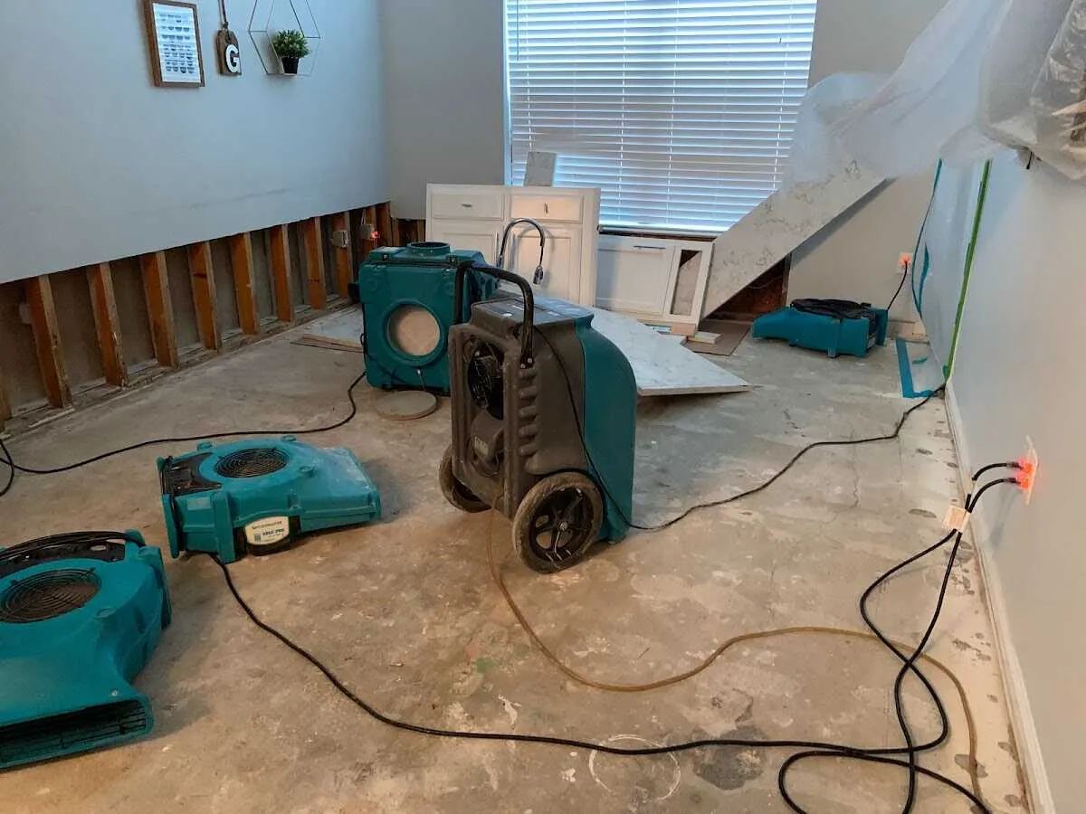Dehumidifier in flood-cut room for Water Damage Restoration in Dover